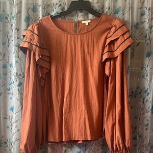 Jodifl Rust Orange Ruffle-Shoulder Long Sleeve Top
